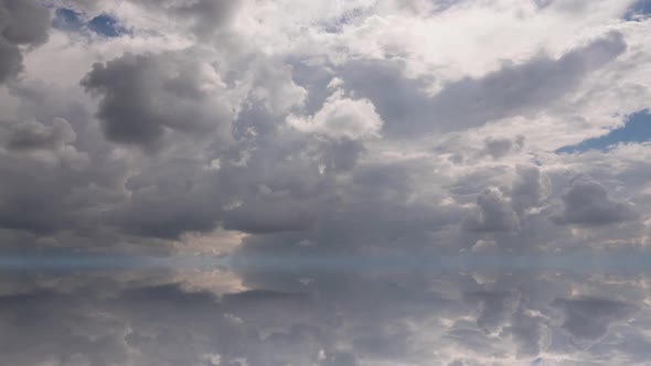 Futuristic Background Consisting of Time Lapse Clip of White Fluffy Clouds Over Blue Sky and Their