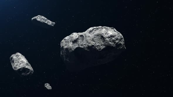 a large number of asteroids fly in outer space toward planet earth