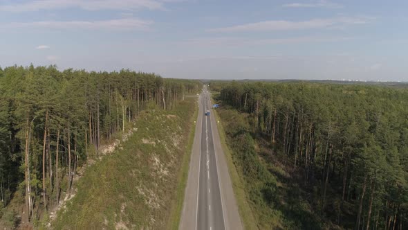 Aerial view of the highway in the autumn forest 06