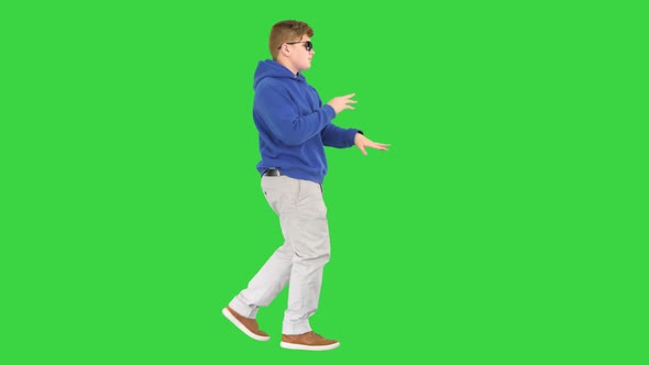 Cool Boy with Sunglasses Walking and Dancing on a Green Screen Chroma Key