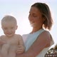 Beautiful Mom Holding Hands Little Cute Son and Playing Together at Nature Countryside - VideoHive Item for Sale