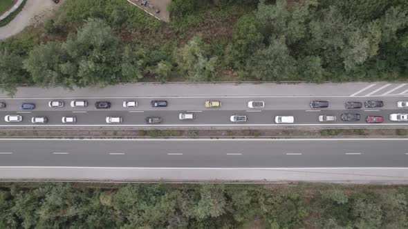 Top Drone View of Closed Road Due to an Accident Many Cars are Waiting to Pass