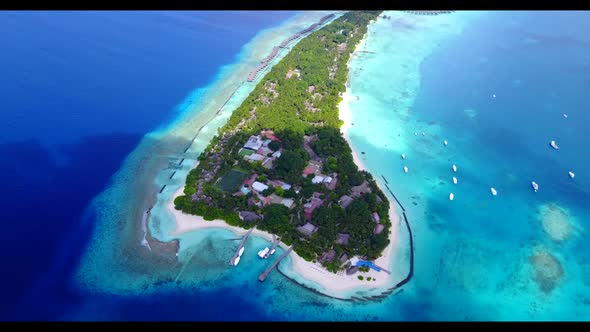 Aerial above travel of relaxing tourist beach lifestyle by blue lagoon and white sand background of 