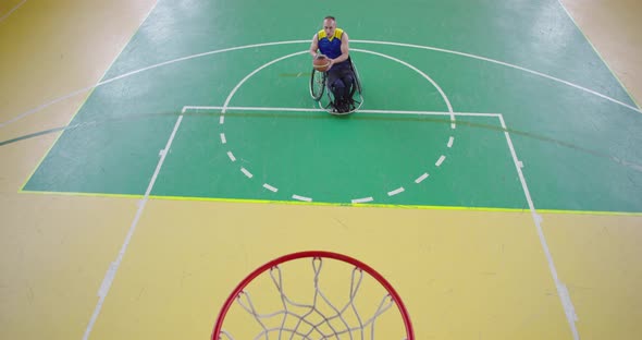 Top View Shot of Person with Disabilities Playing Basketball in the Modern Hall