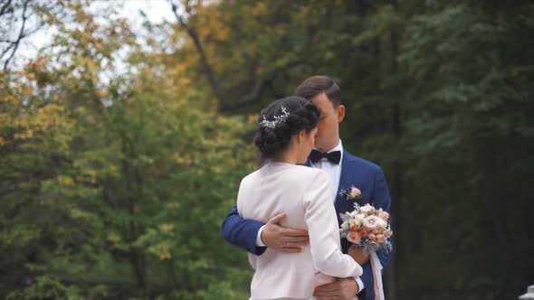 Wedding Couple in Autumn Park.