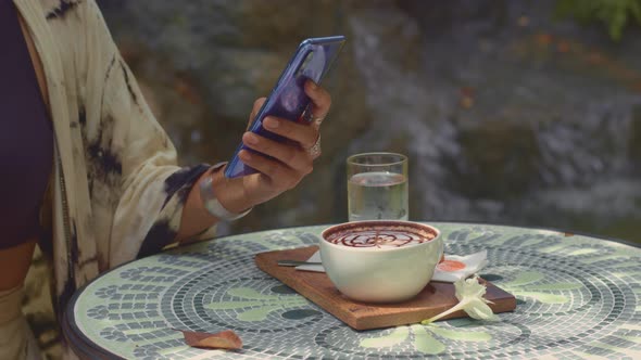 A Lady Take A Photo With Mobile On Coffee Set.