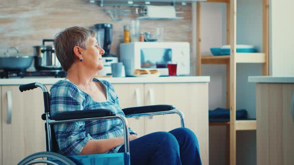 Handicapped Senior Woman Standing Alone