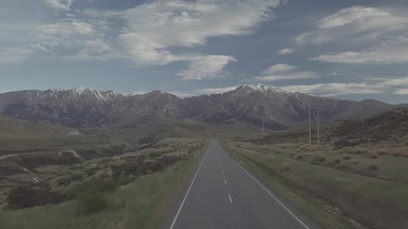 Empty road in mountains aerial