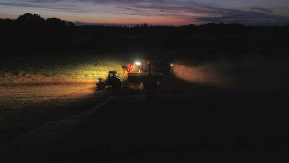 Combine Harvester at Night During the Harvest