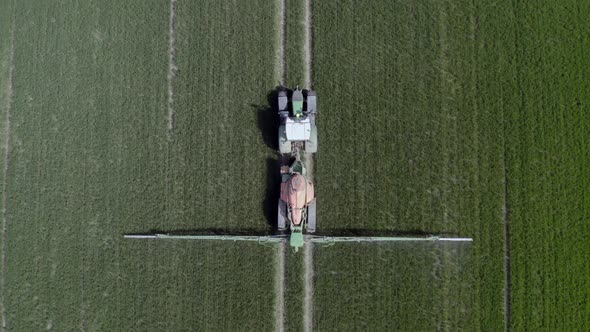 Tractor Spraying a Banned Glyphosate Herbicide on Agricultural Land