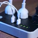 Closeup of a Male Hand Unplugging Cables From the Power Outlet - VideoHive Item for Sale