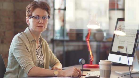 Portrait of Businesswoman at Office Workplace