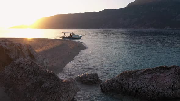 View of Wild Tropical Island Beach at Sunset