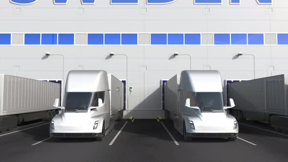 Trailer Trucks at Warehouse Dock with PRODUCT OF SWEDEN Text alt