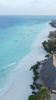 Vertical Video Boats in the Ocean Near the Coast of Zanzibar Tanzania