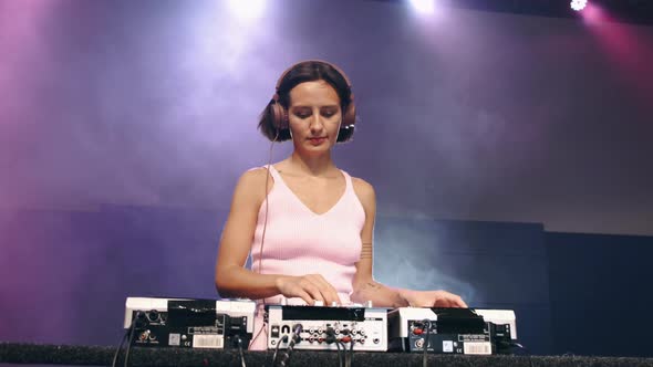 Dj Girl Playing Music at Disco Club