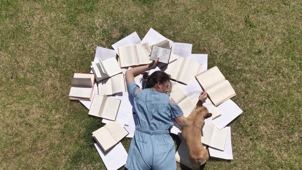 Student Fell Asleep on Books Outdoors Tired