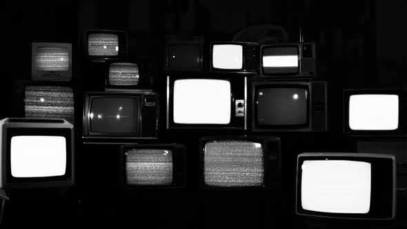 Stacked Retro Televisions Turning On and Off Static Noise. BW Tone.