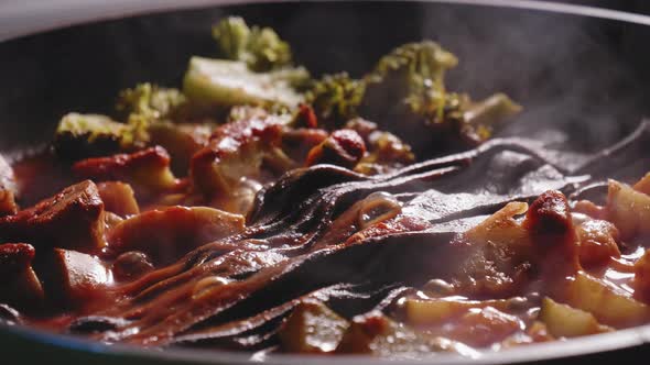 Simmering Pan With Chicken Meat, Vegetables and Sauce, Cooking Chicken Noodles