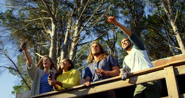 Low angle view of friends having fun in cabin 4k