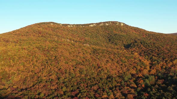 An aerial tracking shot of Halfmoon Mountain, located in West Virginia's Trout Run Valley. Autumn co