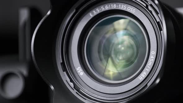 The Camera Lens Rotates Lights Reflecting Off Glass Robotic Camera Movement