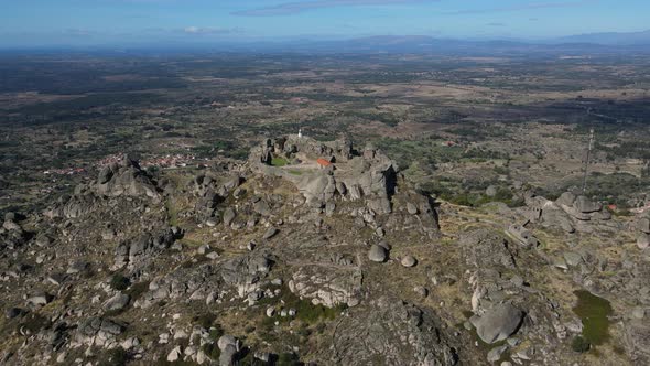 Drone capturing the landscape around Monsanto Castle and presenting an exquisite beauty of the regio