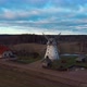Old Araisi Windmill in Latvia Aerial Shot From Above. Winter Day at Sunrise 4K Video - VideoHive Item for Sale