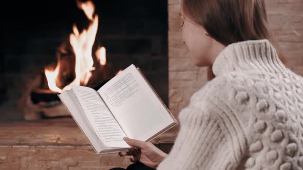 Portrait of Girl Relaxing at Home with Book