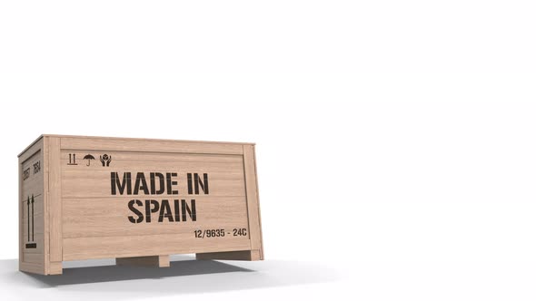 Large Wooden Crate with MADE IN SPAIN Text on White Background