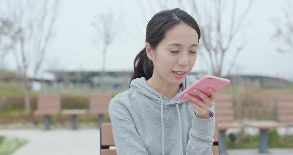 Woman use of mobile phone for online