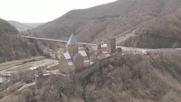 Aerial view of old Ananuri Fortress with two churches and picturesque view on river. Georgia 2021