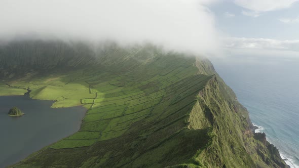 Aerial view of Caldeirao, a lake along the coastline on Corvo island, Azores islands, Portugal.