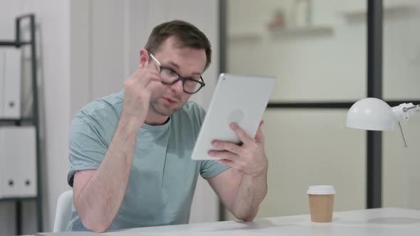 Disappointed Man Reacting To Loss Tablet