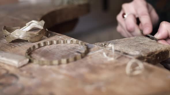 Crop master creating unique jewelry