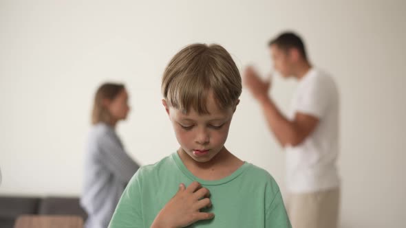 Kid Son Feels Upset While Parents Fighting at Background Sad Little Girl Frustrated with