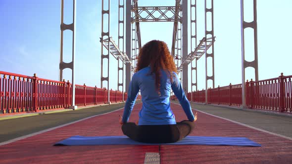 Lady Practising Yoga Outdoor