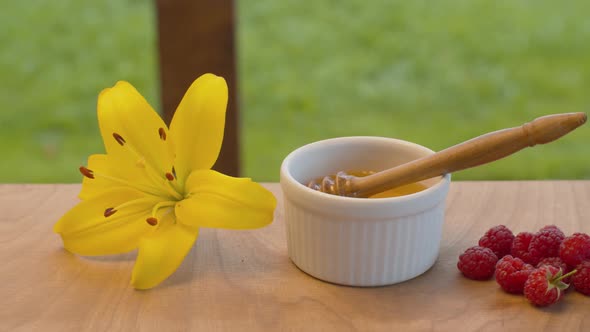 Honey spoon in a bowl with honey