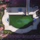 Top View The Camera Rises above the Pool, near new Houses, Investments in New Real Estate - VideoHive Item for Sale