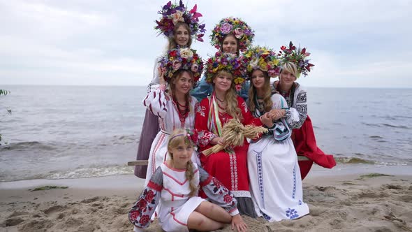 Wide Shot Gorgeous Ukrainian Women and Girl Posing in Slow Motion on Sandy River Beach Outdoors