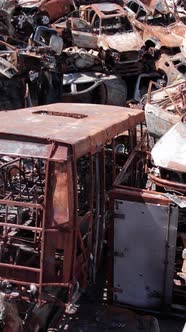 Vertical Video of a Dump of Destroyed Cars During the War in Ukraine