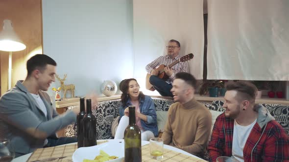Friends Sing Songs with a Guitar