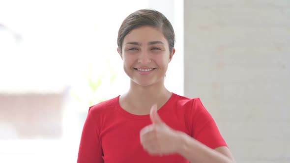 Portrait of Indian Woman Showing Thumbs Up Sign