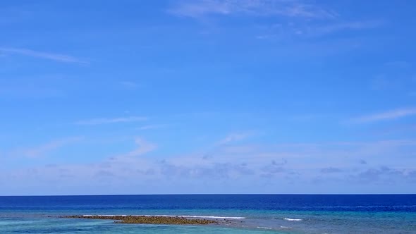 Aerial drone panorama of lagoon beach by blue lagoon with sand background