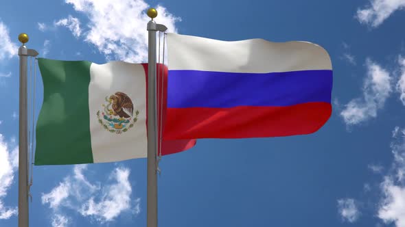 Mexico Flag Vs Russia Flag On Flagpole