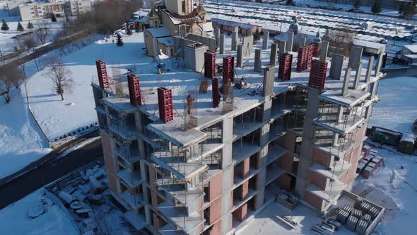 Aerial shot of building residental house on construction site.