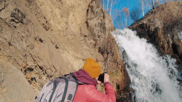 Woman Shoots Waterfall Splashes