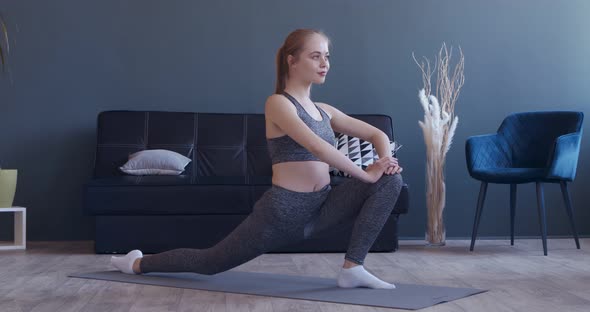 Young Girl Training on Mat at Home