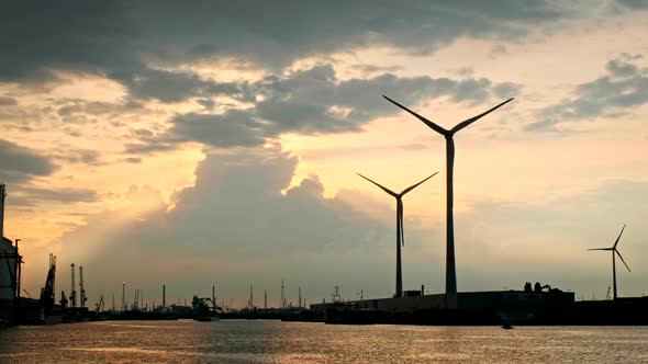 Wind Turbines in Antwerp Port on Sunset