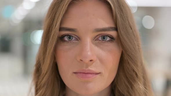 Close Up of Face of Woman Smiling at the Camera